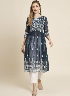 Garb These Beautiful Looking Readymade Anarkali Shape Kurti.These Kurti is Fabricated On Georgette.Its Beautified With Designer Thread Embroidery Work.