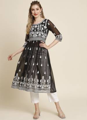 Garb These Beautiful Looking Readymade Anarkali Shape Kurti.These Kurti is Fabricated On Georgette.Its Beautified With Designer Thread Embroidery Work.