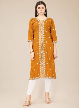 Attrective Looking These Beautiful Looking Readymade Long Kurti.These Kurti is Fabricated On Soft Shiny Silk.Its Beautified With Designer Thread Embroidery Work.