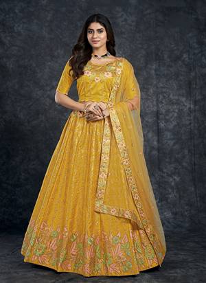 For A Designer Look,Grab These Lehenga Choli in Fine Colored.These Lehenga And Choli Are Fabricated On Italian Silk Pair With Butterfly Net Dupatta.Its Beautified With Designer Thread, Sequance Embroidery,Diamond Work.