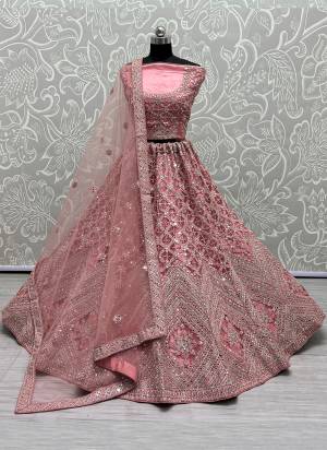 For A Designer Look,Grab These Lehenga Choli With Dupatta in Fine Colored.These Lehenga And Choli Are Bridal Net And Dupatta Are Fabricated On Soft Net Pair.Its Beautified With Designer Fancy Multy Thread,Mirror,Dori Embroidery,Diamond Work.