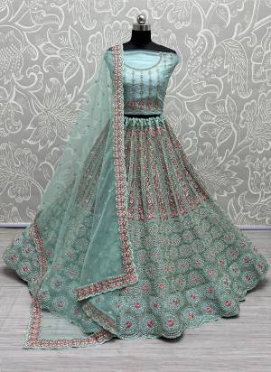 For A Designer Look,Grab These Lehenga Choli With Dupatta in Fine Colored.These Lehenga And Choli Are Bridal Net And Dupatta Are Fabricated On Soft Net Pair.Its Beautified With Designer Fancy Multy Thread,Mirror,Dori Embroidery,Diamond Work.