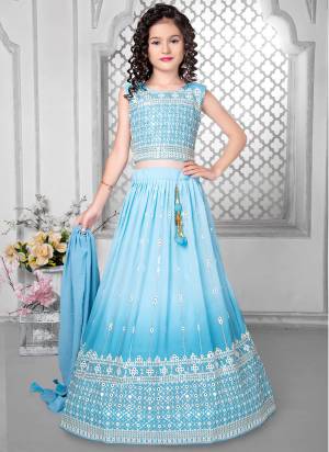 For A Designer Look,Grab These Kidswear Readymade Lehenga Choli in Fine Colored.These Lehenga And Choli Are Fabricated On Faux Georgette Pair With Faux Georgette Dupatta.Its Beautified With Designer Thread,Sequance Embroidery Work.