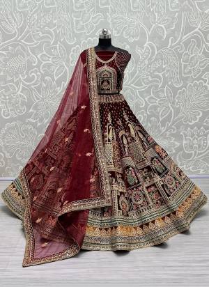 For A Designer Look,Grab These Lehenga Choli With Dupatta in Fine Colored.These Lehenga And Choli Are Velvet And Dupatta Are Fabricated On Soft Net Pair.Its Beautified With Designer Fancy Multy Thread,Sequance,Dori Embroidery,Diamond Work.