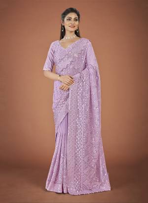 Garb These Party Wear Saree in Fine Colored.These Saree And Blouse is Fabricated On Georgette.Its Beautified With Designer Thread,Sequance  Embroidery Work.