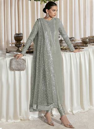 Attrective These Designer Suit in Fine Colored Pair With Bottom And Dupatta.These Top Are Faux Georgette And Dupatta Are Fabricated On Net Pair With Santoon Bottom.Its Beautified With Santoon Inner.Its Beautified With Heavy Designer Sequance Embroidery Work.