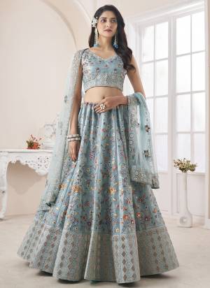 For A Designer Look,Grab These Lehenga Choli in Fine Colored.These Lehenga And Choli Are Fabricated On Art Silk Pair With Soft Net Dupatta.Its Beautified With Heavy Designer Embroidery,Zarkan Work.