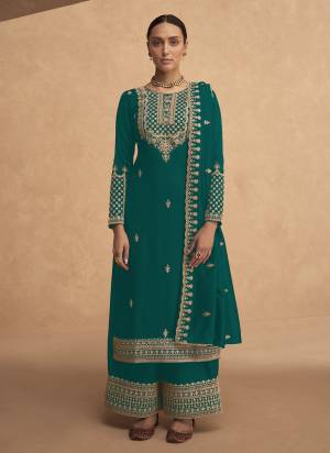 Garb These Designer Plazzo Suits in Fine Colored Pair With Dupatta.These Top Are Georgette And Dupatta Are Fabricated On Georgette Pair With Georgette Bottom.Its Beautified With Heavy Designer Sequance,Jari Embroidery Work.