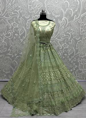 For A Fancy Designer Look,Grab These Lehenga Choli With Dupatta in Fine Colored.These Lehenga And Choli Are Heavy Net And Dupatta Are Fabricated On Soft Net Pair.Its Beautified With Designer Fancy Multy Thread,Rainbow Sequance Embroidery,Diamond Work.