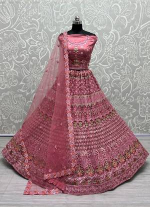 For A Fancy Designer Look,Grab These Lehenga Choli With Dupatta in Fine Colored.These Lehenga And Choli Are Heavy Net And Dupatta Are Fabricated On Soft Net Pair.Its Beautified With Designer Fancy Multy Thread,Jari Embroidery,Diamond Work.