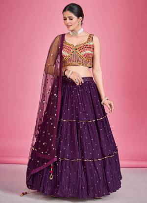 For A Designer Look,Grab These Lehenga Choli in Fine Colored.These Lehenga And Blouse Are Fabricated On Georgette Pair With Soft Net Dupatta.Its Beautified With Thread,Mirror,Sequance Embroidery Work.