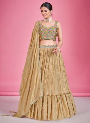 For A Designer Look,Grab These Lehenga Choli in Fine Colored.These Lehenga And Blouse Are Fabricated On Georgette Pair With Georgette Dupatta.Its Beautified With Thread,Mirror Embroidery Work.