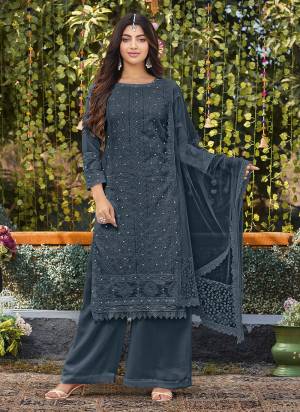 Attrective Looking These Plazzo Suit in Fine Colored Pair With Bottom And Dupatta.These Top And Bottom Are Faux Georgette And Dupatta Are Fabricated On Net Pair.Its Beautified With Heavy Designer Cotton Thread Embroidery Work.