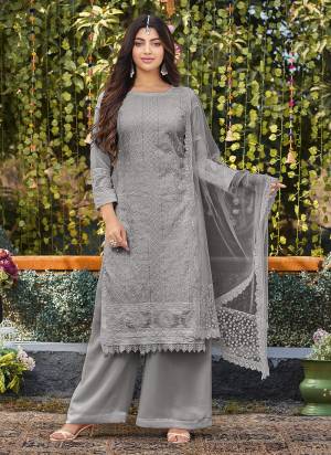 Attrective Looking These Plazzo Suit in Fine Colored Pair With Bottom And Dupatta.These Top And Bottom Are Faux Georgette And Dupatta Are Fabricated On Net Pair.Its Beautified With Heavy Designer Cotton Thread Embroidery Work.