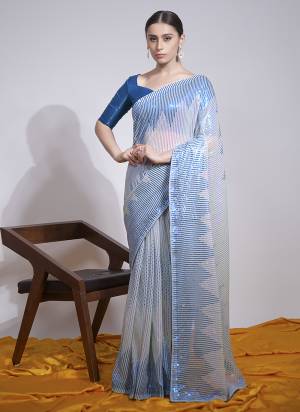 Attrective Look These Saree in Fine Colored.These Saree Are Georgette And Blouse is Mono Banglori Fabricated.Its Beautified With Designer Sequance Embroidery Work.