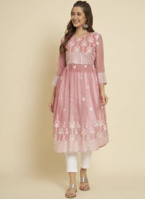 Attrective These Beautiful Looking Readymade Long Kurti.These Kurti is Fabricated On Georgette.Its Beautified With Designer Thread Embroidery Work.