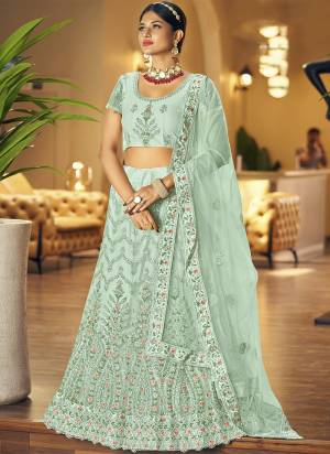 Garb This Partywear Fine Color Heavy Designer Lehemga Choli Fabric Are Soft Net And And Dupatta Soft Net In Fabricated Beautified With Attrective Reaham Embroidery,Diamond Work. Buy Now.