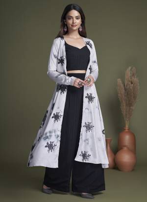 Grab These Beautiful Looking Designer Plazzo Suits With Koti.These Top And Koti Are Silk And Bottom Is Georgette Fabricated.Its Beautified With Designer Embroidery Work.