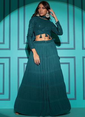 A Designer Look,Grab These Lehenga Choli in Fine Colored.These Lehenga And Blouse Are Georgette And Dupatta Are Fabricated On Georgette.Its Beautified With Plitting Pattern With Thread,Sequance Embroidery Work.