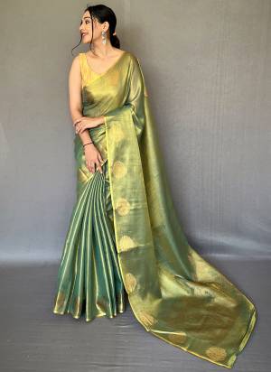 Garb These Party Wear Saree With Blouse in Fine Colored.These Saree And Blouse is Fabricated On Tissue Silk.Its Beautified With Heavy Weavon Jari,Rich Pallu Designer.