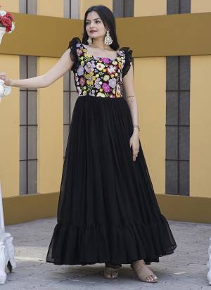 Garb These Beautiful Looking Readymade Gown.These Gown is Fabricated On Faux Georgette.Its Beautified With Designer Sequance,Thread Embroidery Work.