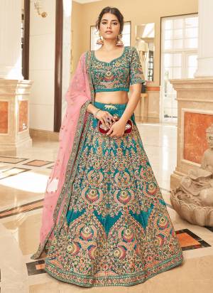 For A Designer Look,Grab These Lehenga Choli in Fine Colored.These Lehenga And Blouse Are Fabricated On Velvet Pair With Soft Net Dupatta.Its Beautified With Designer Thread,Dori,Sequance Embroidery Work.