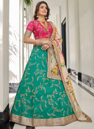 For A Designer Look,Grab These Lehenga Choli in Fine Colored.These Lehenga Are Art Silk And Blouse Are Fabricated On Art Silk Pair With Organza Dupatta.Its Beautified With Designer Thread,Dori,Sequance Embroidery Work.