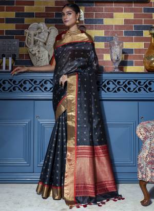 Garb These Party Wear Saree in Fine Colored.These Saree And Blouse is Fabricated On Tussar Silk.Its Beautified With Weaving Bandhni Style Designer.