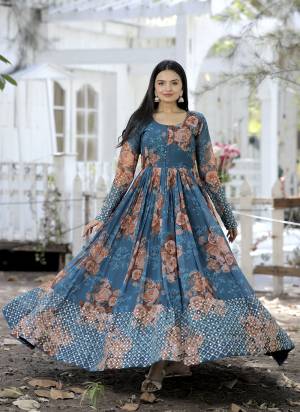 Garb These Beautiful Looking Readymade Gown.These Gown is Fabricated On Faux Georgette.Its Beautified With Designer Digital Printed With Embroidery Work.