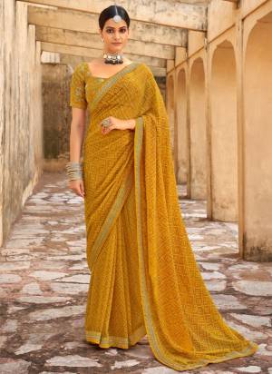 Look These Saree in Fine Colored.These Saree Are Georgette And Blouse is Fabricated On Dupion Pair.Its Beautified With Designer Bandhni Printed With Embroidery Work Lace Border Blouse.