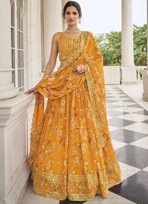 Garb This Partywear Fine Color Heavy Designer Lehemga Choli Fabric Are Faux Georgette And And Dupatta Faux Georgette In Fabricated Beautified With Attrective Floral Digital Printed,Thread,Sequance Embroidery Work. Buy Now.