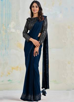 Look Attrective These Designer Party Wear Saree in Fine Colored.These Saree Are Satin Silk Crepe And Blouse Satin Silk Crepe is Fabricated.Its Beautified Designer Embroidery Work.