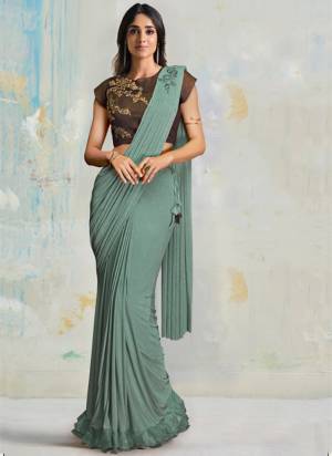 Look Attrective These Designer Party Wear Saree in Fine Colored.These Saree Are Lycra And Blouse Lycra is Fabricated.Its Beautified Designer Embroidery Work.