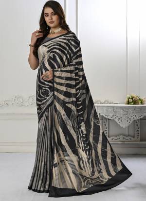 Garb These Designer Party Wear Saree in Fine Colored.These Saree And Blouse is Fabricated On Crepe Silk Pair.Its Beautified With Designer Digital Printed.