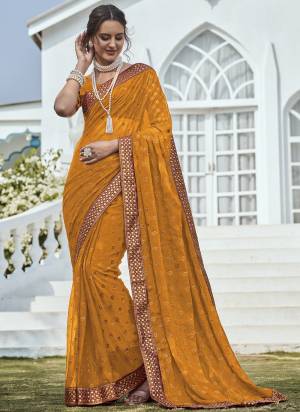 Garb These Saree in Fine Colored.These Saree Are Shimmer And Blouse is Fabricated On Art Silk Pair.Its Beautified With Blooming Color,Heavy Copper Jari With Real Mirror Embroidery Work.