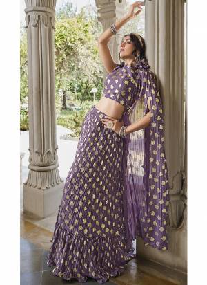 For A Designer Look,Grab These Lehenga Choli in Fine Colored.These Lehenga And Blouse Are Fabricated On Georgette Pair With Georgette Dupatta.Its Beautified With Designer Metalic Foil Printed With Crush Pattern.