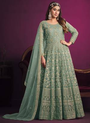 Grab These Anarkali Suit in Fine Colored Pair With Bottom And Dupatta.These Top And Dupatta Are Fabricated On Net Pair With Santoon Bottom And Inner.Its Beautified With Heavy Designer Coding Embroidery Work.