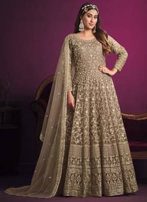 Grab These Anarkali Suit in Fine Colored Pair With Bottom And Dupatta.These Top And Dupatta Are Fabricated On Net Pair With Santoon Bottom And Inner.Its Beautified With Heavy Designer Coding Embroidery Work.