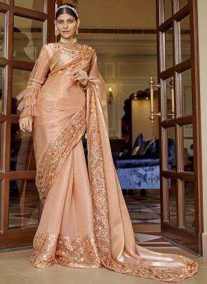 Attrective These Heavy Designer Saree in Fine Colored.These Saree Are Jimmy Choo Chiffon And Blouse is Fabricated On Fancy Art Silk Pair.Its Beautified With Heavy Sequance Embroidery Work.