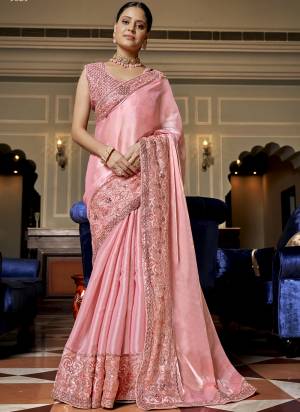 Attrective These Heavy Designer Saree in Fine Colored.These Saree Are Jimmy Choo Chiffon And Blouse is Fabricated On Fancy Art Silk Pair.Its Beautified With Heavy Sequance Embroidery Work.