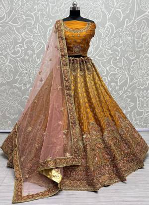 For A Fancy Designer Look,Grab These Lehenga Choli With Dupatta in Fine Colored.These Lehenga And Choli Are Bridal Net And Dupatta Are Fabricated On Soft Net Pair.Its Beautified With Designer Fancy Multy Thread,Sequance,Dori Embroidery,Diamond Work.