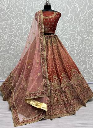 For A Fancy Designer Look,Grab These Lehenga Choli With Dupatta in Fine Colored.These Lehenga And Choli Are Bridal Net And Dupatta Are Fabricated On Soft Net Pair.Its Beautified With Designer Fancy Multy Thread,Sequance,Dori Embroidery,Diamond Work.