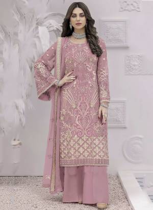 Attrective These Designer Suit in Fine Colored Pair With Bottom And Dupatta.These Top Are Faux Georgette And Dupatta Are Fabricated On Nazmin Pair With Santoon Bottom.Its Beautified With Santoon Inner.Its Beautified With Heavy Designer Embroidery Work.