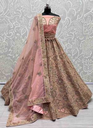 For A Fancy Designer Look,Grab These Lehenga Choli With Dupatta in Fine Colored.These Lehenga And Choli Are Bridal Net And Dupatta Are Fabricated On Soft Net Pair.Its Beautified With Designer Fancy Multy Thread,Sequance,Dori Embroidery,Diamond Work.