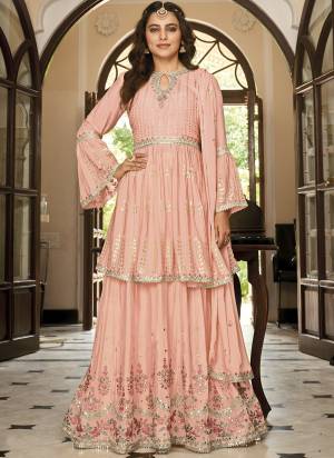 Attrective These Sharara Suit in Fine Colored Pair With Free Size Stiched Bottom And Dupatta.These Top And Bottom Are Fabricated On Chinon Pair With Chinon Dupatta.Its Beautified With Santoon Inner.Its Beautified With Heavy Designer Embroidery Work.