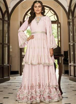 Attrective These Sharara Suit in Fine Colored Pair With Free Size Stiched Bottom And Dupatta.These Top And Bottom Are Fabricated On Chinon Pair With Chinon Dupatta.Its Beautified With Santoon Inner.Its Beautified With Heavy Designer Embroidery Work.