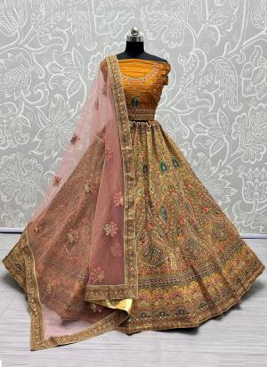 For A Fancy Heavy Designer Look,Grab These Lehenga Choli With Dupatta in Fine Colored.These Lehenga And Choli Are Bridal Net And Dupatta Are Fabricated On Soft Net Pair.Its Beautified With Designer Fancy Multy Thread, Sequance,Dori Embroidery,Diamond Work.