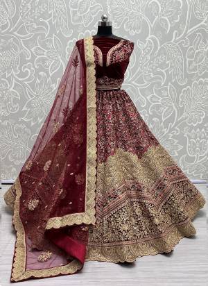 For A Fancy Heavy Designer Look,Grab These Lehenga Choli With Dupatta in Fine Colored.These Lehenga And Choli Are Velvet And Dupatta Are Fabricated On Soft Net  Pair.Its Beautified With Designer Fancy Multy Thread, Sequance,Dori Embroidery,Diamond Work.