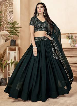 For A Designer Look,Grab These Lehenga Choli in Fine Colored.These Lehenga And Dupatta Are Fabricated On Faux Georgette Pair With Faux Georgette Blouse.Its Beautified With Designer Thread, Sequance Embroidery Work.