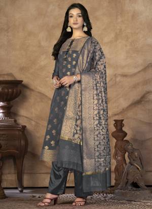 Grab These Suit in Fine Colored Pair With Bottom And Dupatta.These Top And Dupatta Are Fabricated On Banarasi Silk Pair With Santoon Bottom.Its Beautified With Wevon Jacquard Designer.